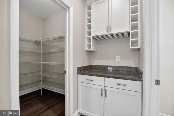 a kitchen with a cabinets and a stove
