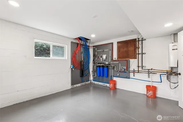 a living room with furniture and flat screen tv