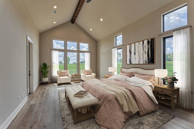 a bathroom with a double vanity sink a mirror and a bathtub next to a window