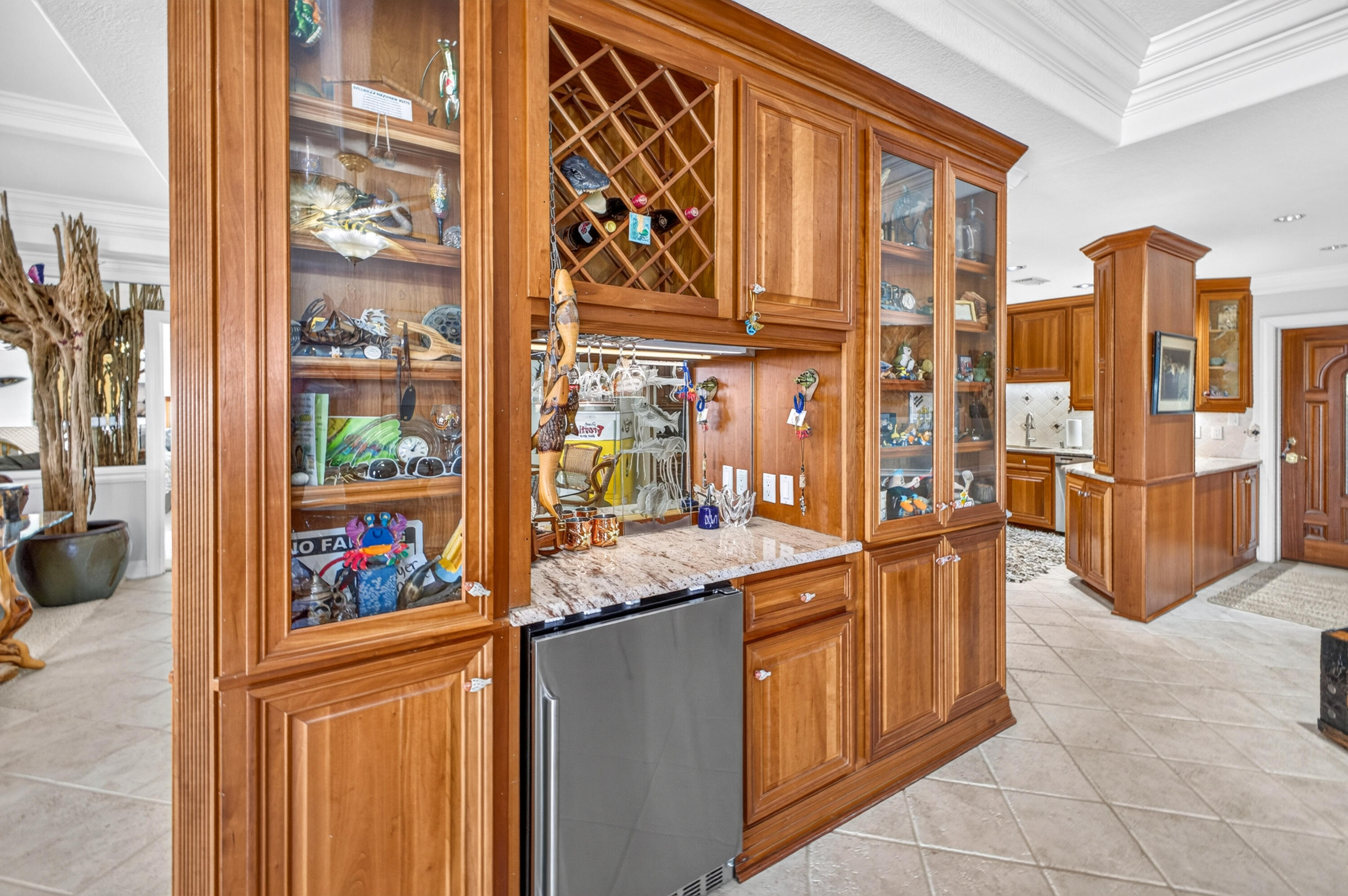 30 Moreno Point Road, Unit 703A Destin, FL 32541 - Photo 23 of 60 a kitchen with stainless steel appliances granite countertop a refrigerator and a stove