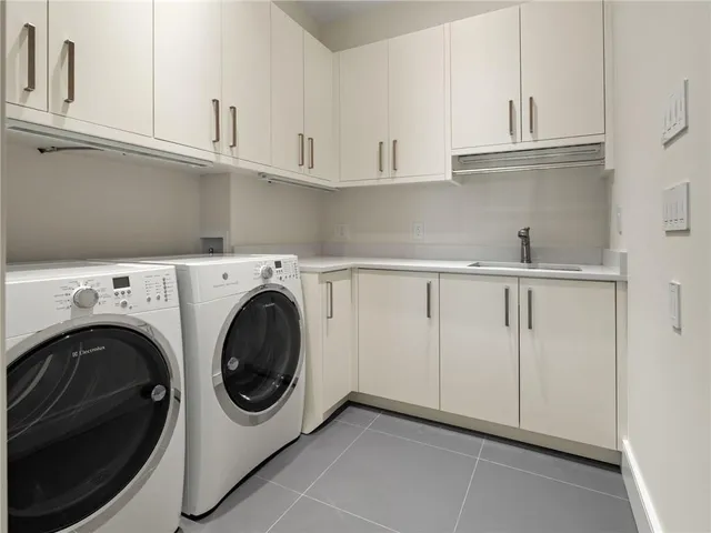a white bath tub sitting in a bathroom