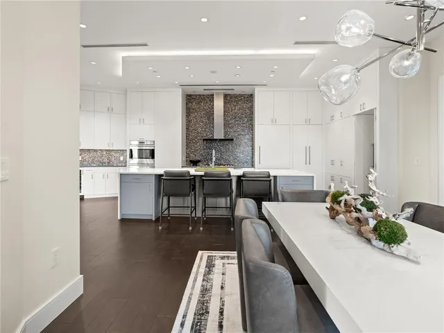 a bed room with a bed and a large window