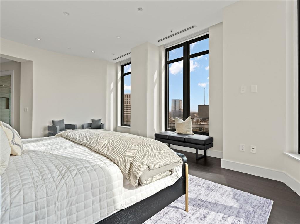 3376 Peachtree Road Northeast, Unit 35B Atlanta, GA 30326 - Photo 40 of 80 a bedroom with a bed and a window