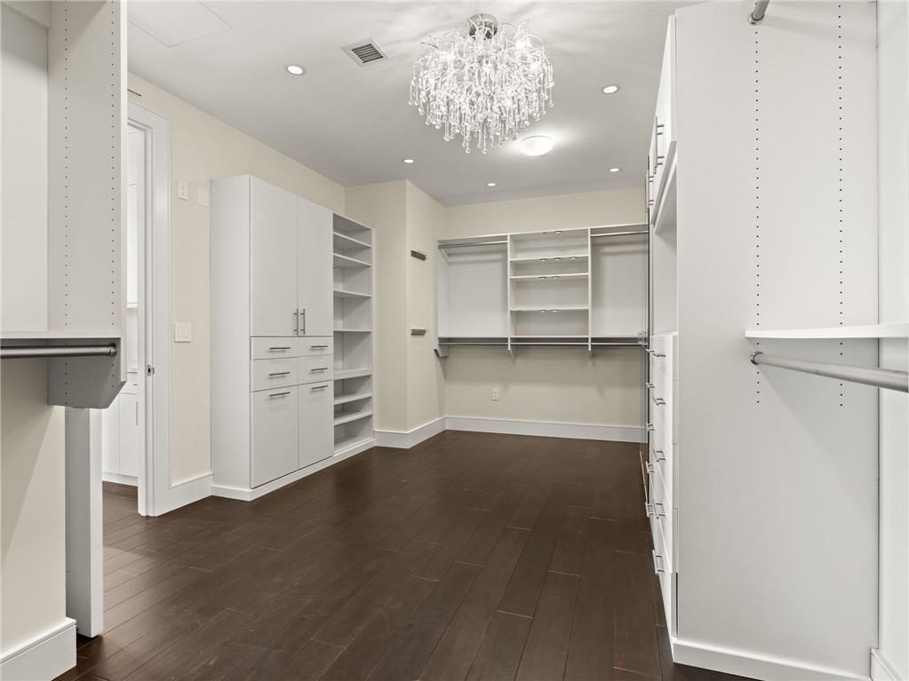 3376 Peachtree Road Northeast, Unit 35B Atlanta, GA 30326 - Photo 48 of 80 wooden floor in an empty room with a window