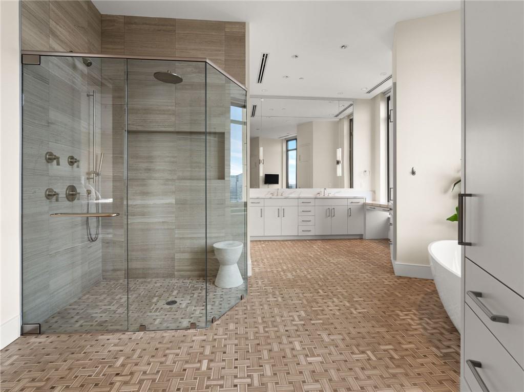 3376 Peachtree Road Northeast, Unit 35B Atlanta, GA 30326 - Photo 52 of 80 a bathroom with a shower and a sink