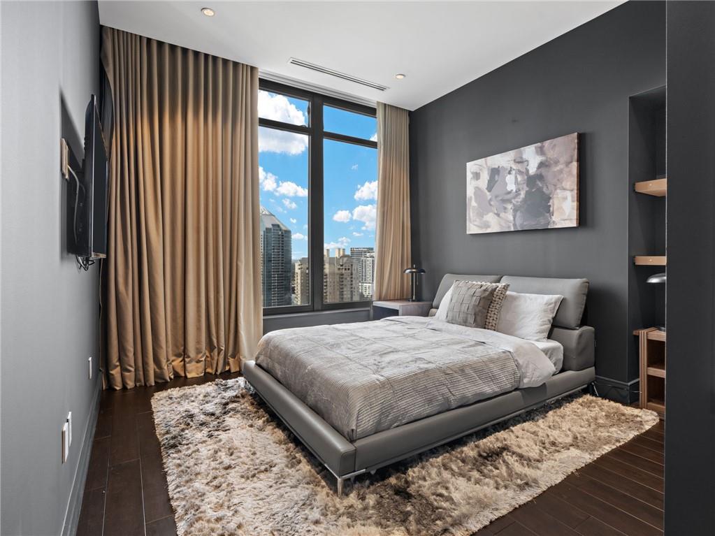 3376 Peachtree Road Northeast, Unit 35B Atlanta, GA 30326 - Photo 66 of 80 a bedroom with a bed and a window