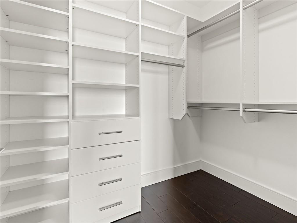 3376 Peachtree Road Northeast, Unit 35B Atlanta, GA 30326 - Photo 71 of 80 a view of walk in closet with empty racks