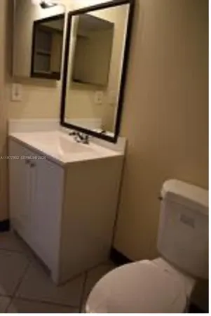 a bathroom with a sink and a toilet