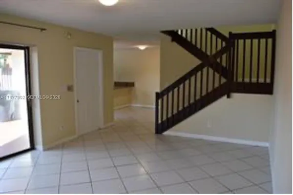 a view of a hallway with entryway