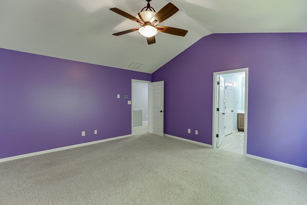 2365 Valley Mill Drive Buford, GA 30519 - Photo 27 of 53 a big room with chandelier fan and windows