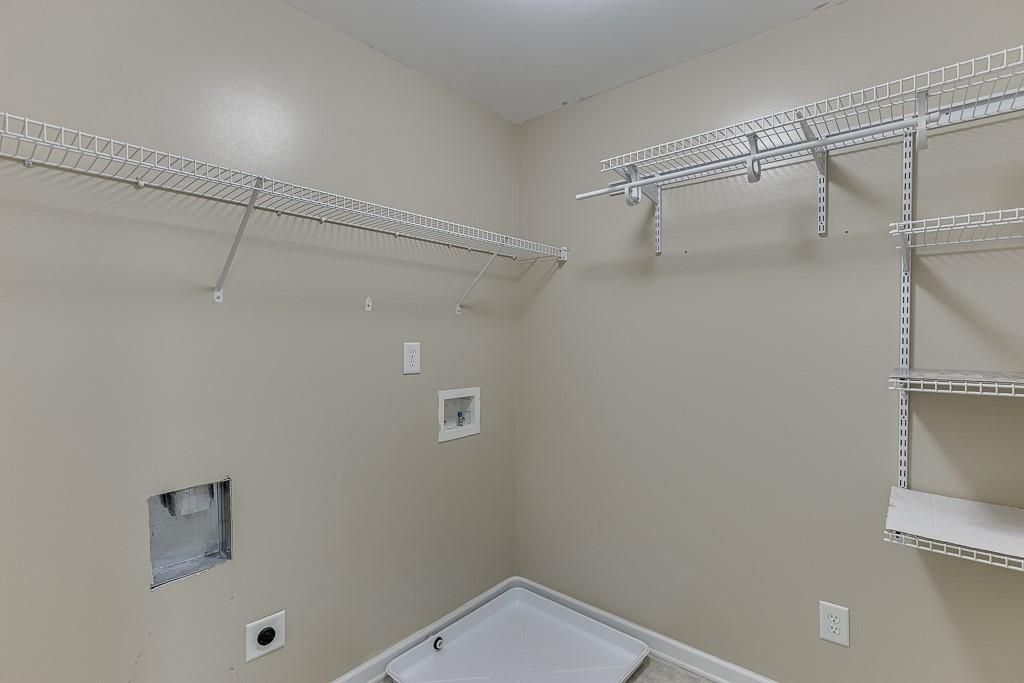 2365 Valley Mill Drive Buford, GA 30519 - Photo 37 of 53 a view of a room with racks on the wall