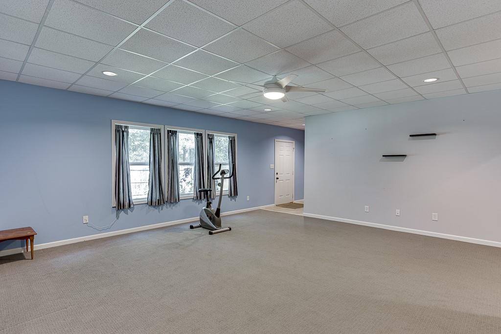 2365 Valley Mill Drive Buford, GA 30519 - Photo 41 of 53 an empty room with windows