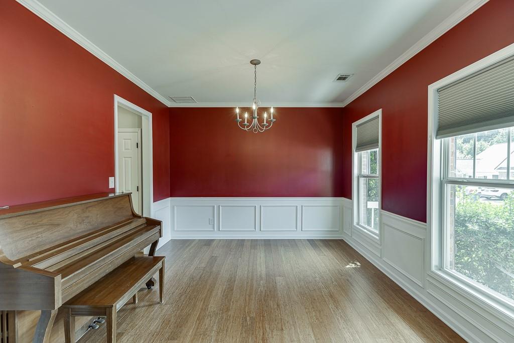 2365 Valley Mill Drive Buford, GA 30519 - Photo 5 of 53 a room with wooden floor and windows