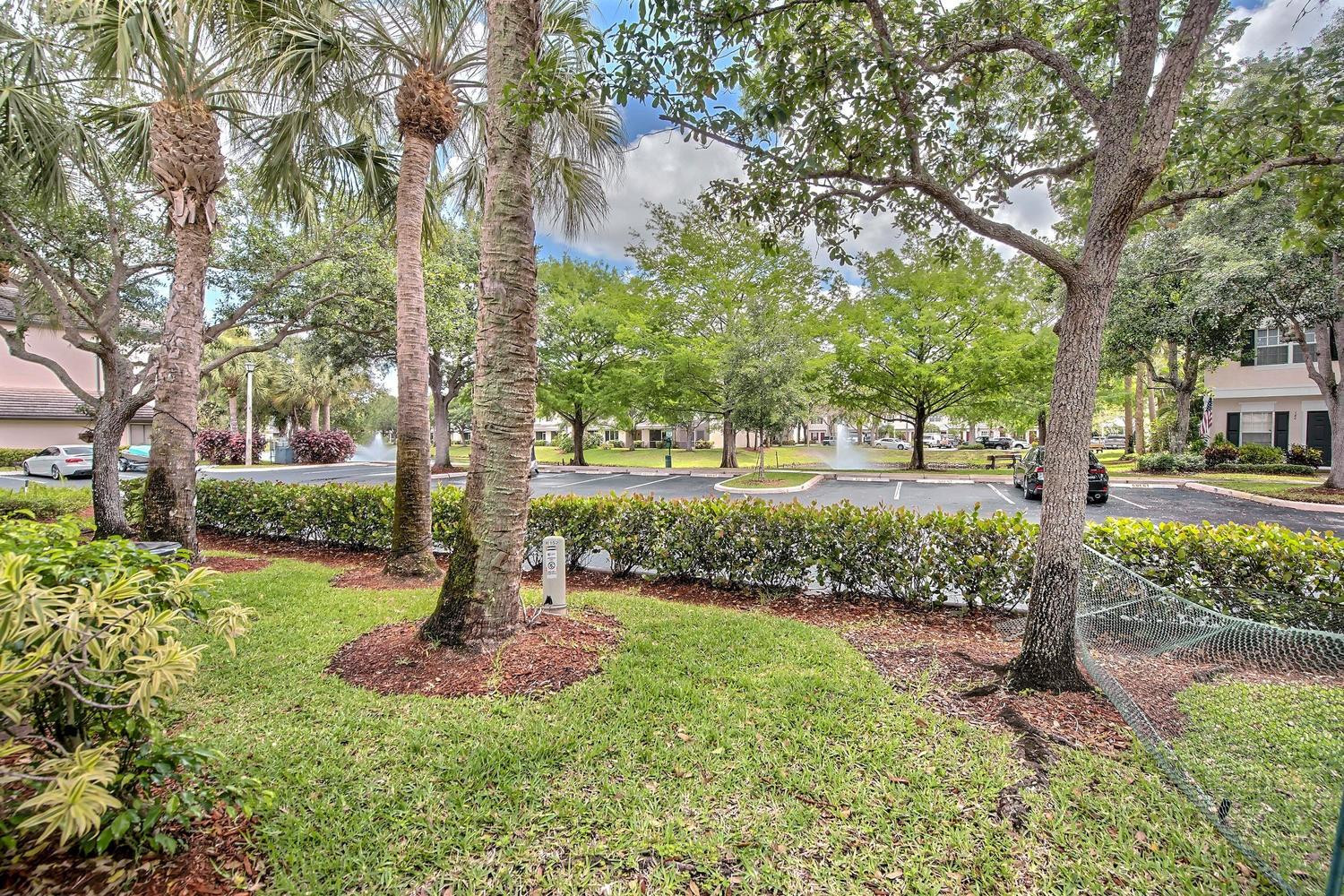 154 Southwest 96th Terrace Plantation, FL 33324 - Photo 8 of 10 a view of a garden with a tree