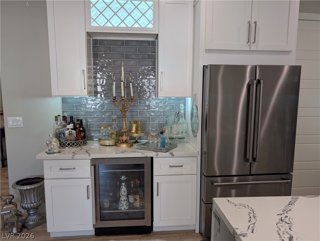 251 Spring Heights Caliente, NV 89008 - Photo 12 of 27 This sleek kitchen features modern appliances and elegant tile, perfect for culinary endeavors and entertaining.