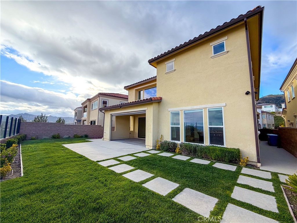20626 Deer Grass Court Porter Ranch, CA 91326 - Photo 1 of 45 a view of house with yard and entertaining space
