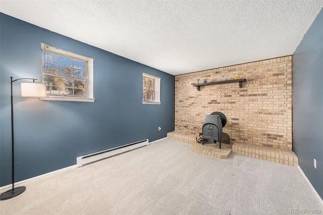 a bedroom with a bed and a table in it