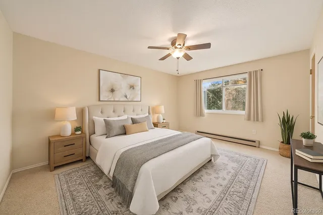 a bedroom with bed and a window