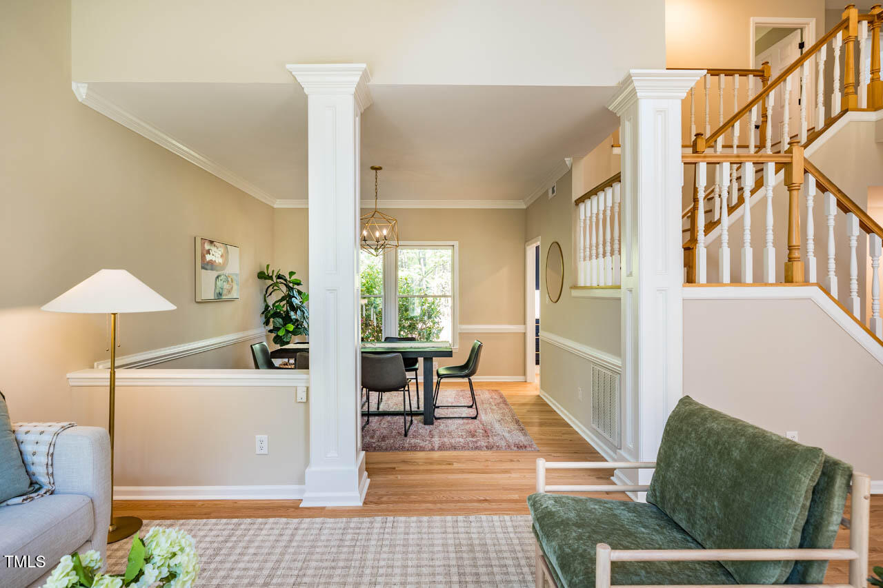 103 Windhover Drive Chapel Hill, NC 27514 - Photo 13 of 61 a living room with furniture and a rug