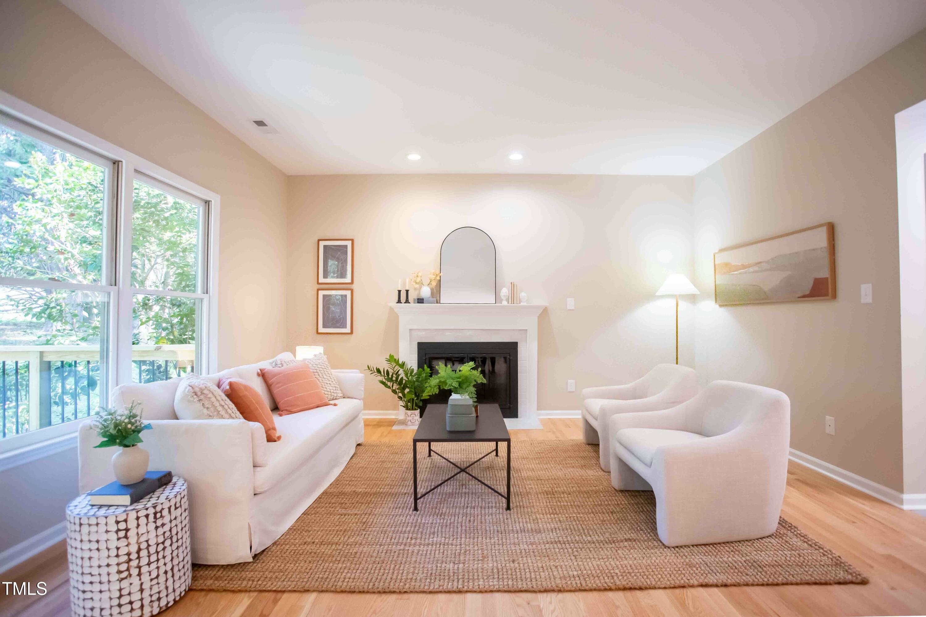 103 Windhover Drive Chapel Hill, NC 27514 - Photo 23 of 61 a living room with furniture and a potted plant