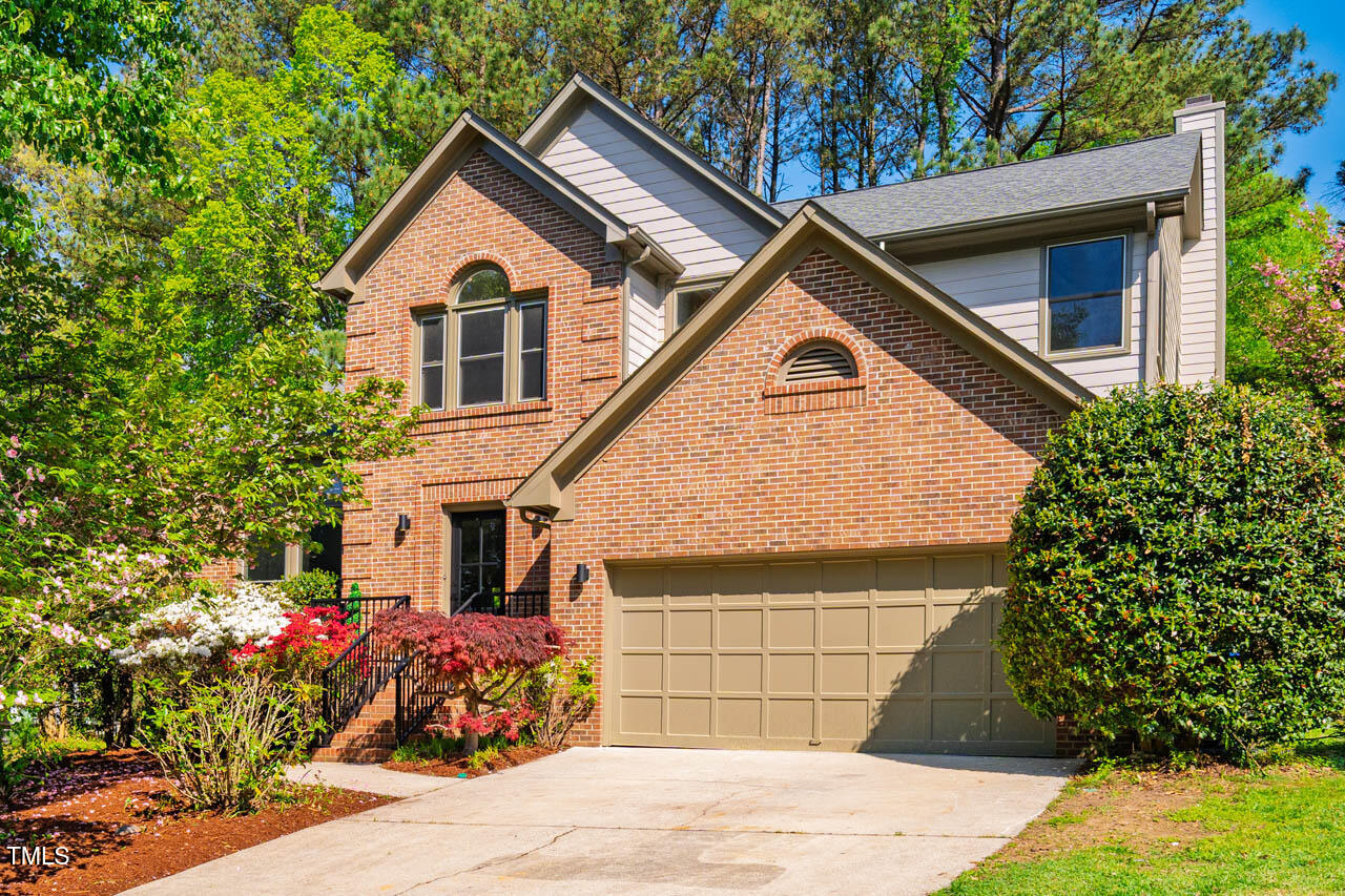 103 Windhover Drive Chapel Hill, NC 27514 - Photo 2 of 61 a front view of a house with a yard