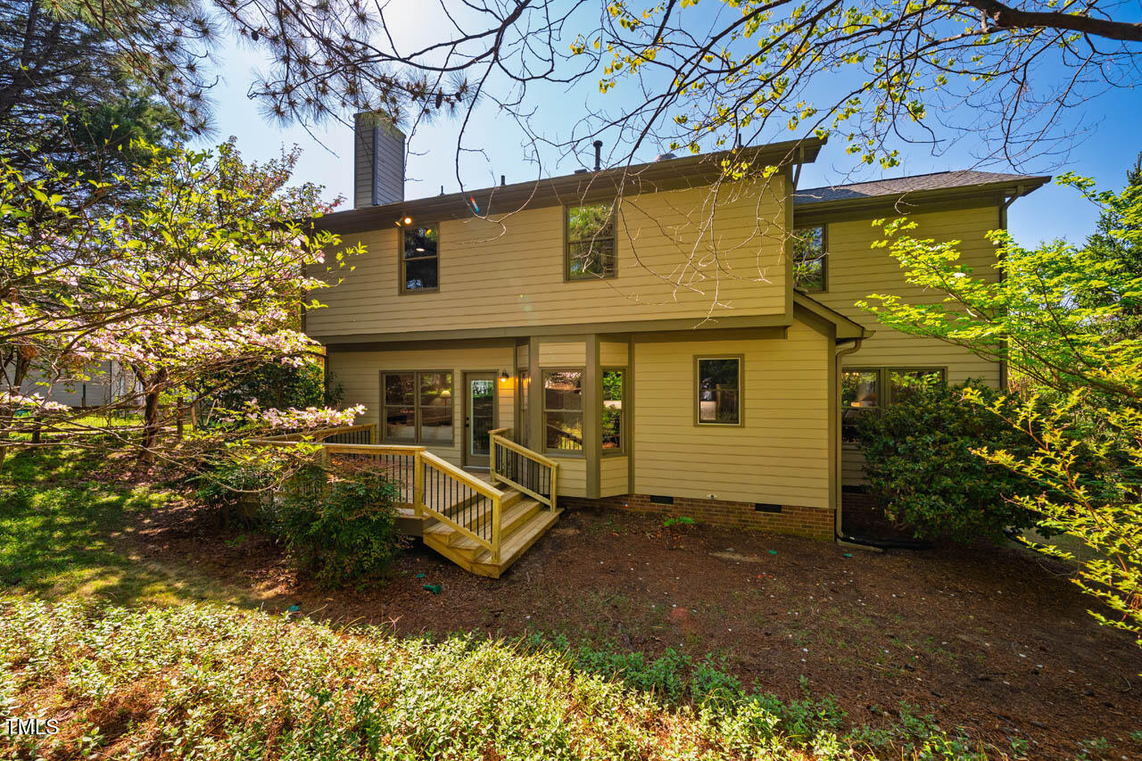 103 Windhover Drive Chapel Hill, NC 27514 - Photo 48 of 61 a view of a house with a yard