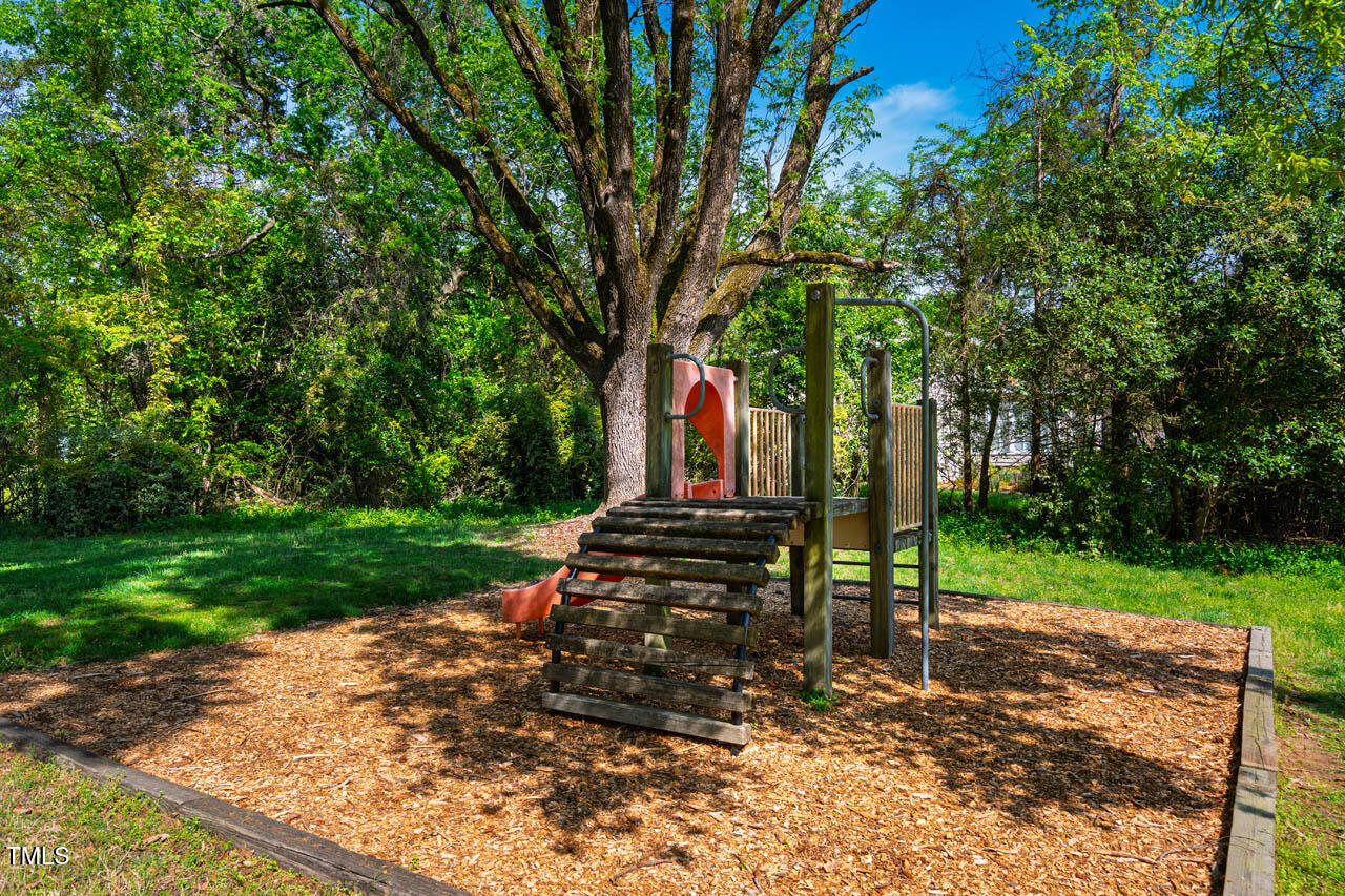 103 Windhover Drive Chapel Hill, NC 27514 - Photo 54 of 61 a view of a park with large trees
