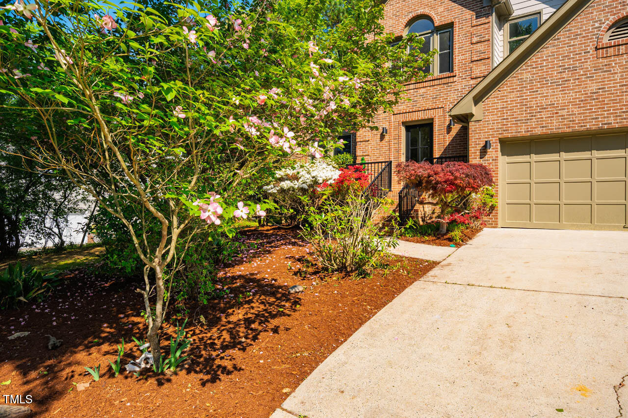 103 Windhover Drive Chapel Hill, NC 27514 - Photo 59 of 61 a front view of a house with a yard