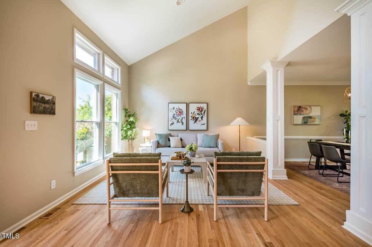 103 Windhover Drive Chapel Hill, NC 27514 - Photo 9 of 61 a living room with furniture and wooden floor