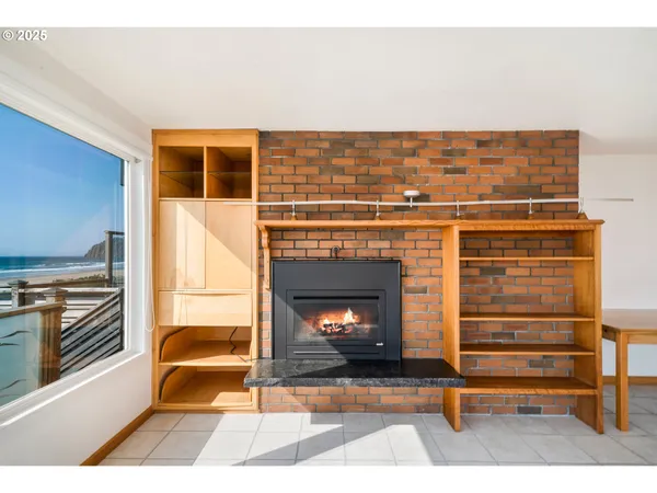 a kitchen with stainless steel appliances a stove a sink and a refrigerator