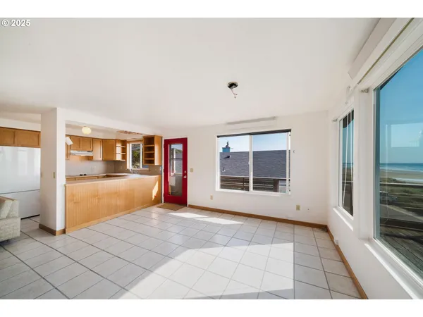 a view of a chairs and table on the terrace