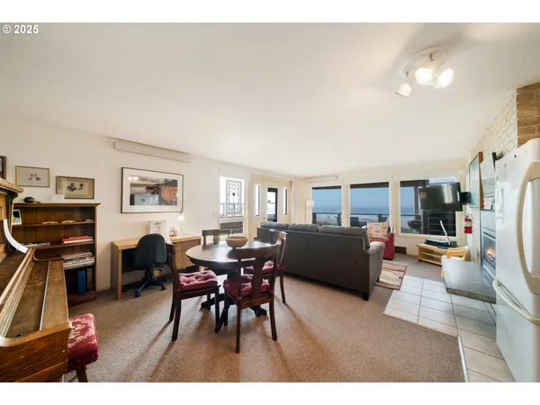 a living room with furniture and a table