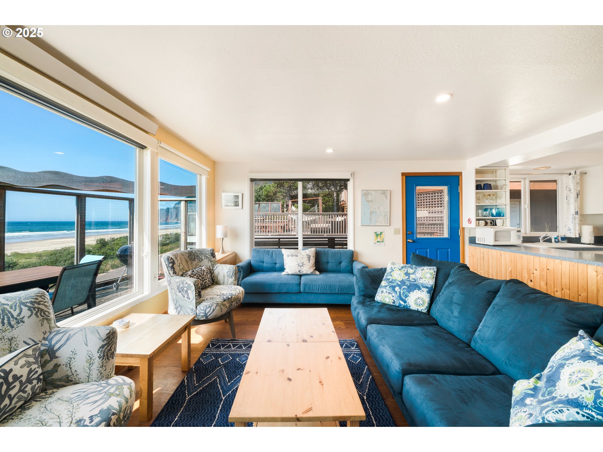 640 Ocean Road Manzanita, OR 97130 - Photo 9 of 47 a living room with furniture and a large window