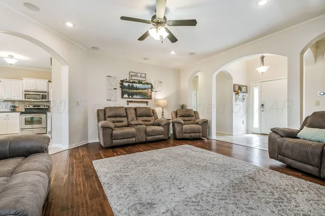 a living room with furniture and a couch