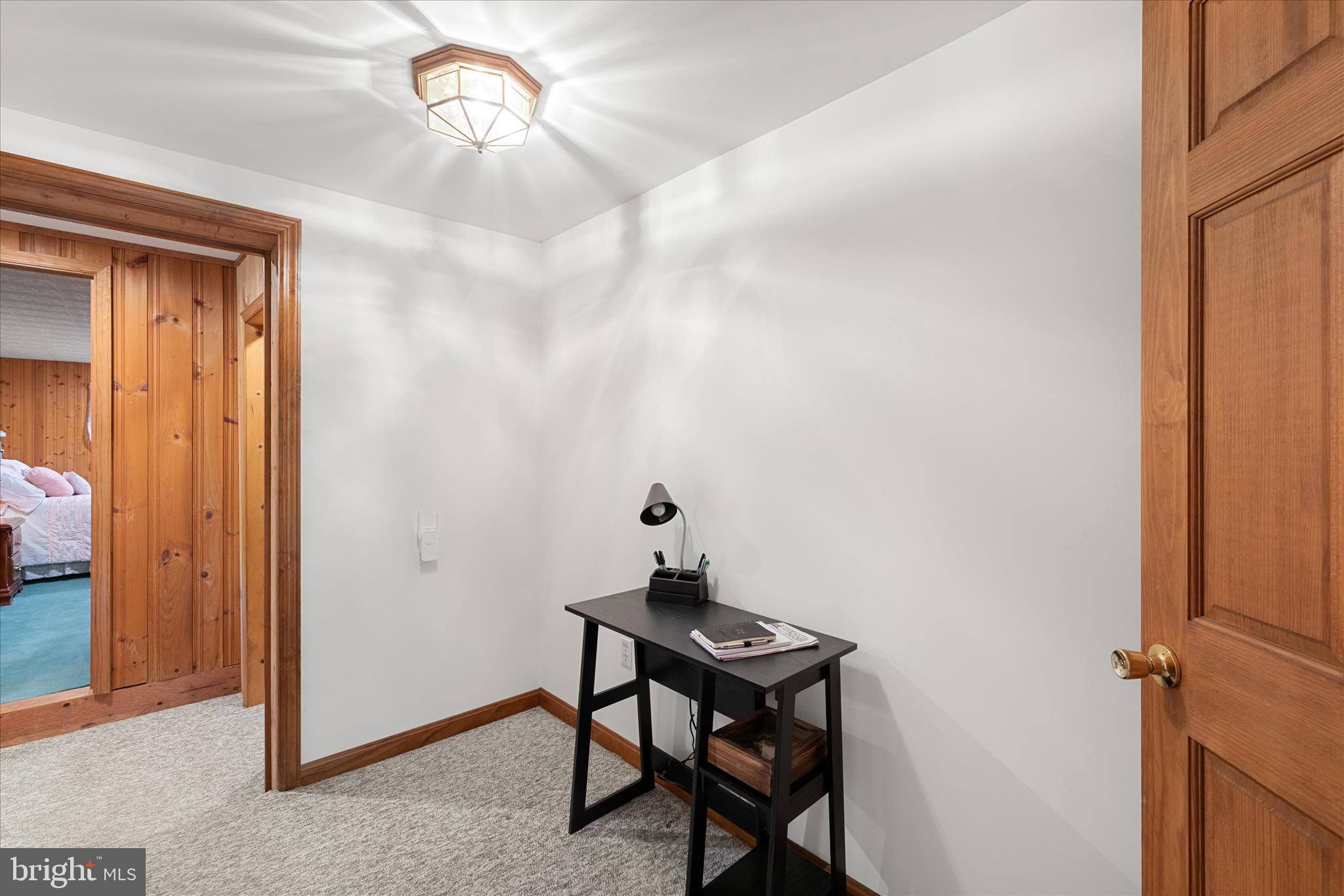 251 Rings End Road Millington, MD 21651 - Photo 17 of 47 a room with a table and a chandelier