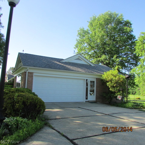 3901 Industry Road Rootstown, OH 44272 - Photo 2 of 22 There is a lot of room to park for guests and family. The garage has glazed tile walls!