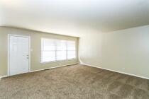 5408 31st Street Lubbock, TX 79407 - Photo 3 of 33 an empty room with a window