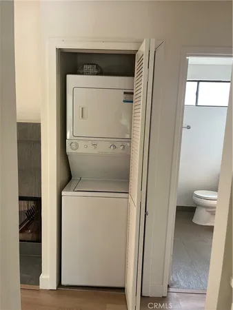 a view of bathroom with a toilet and a sink