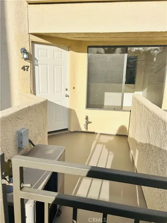 a view of a living room and bathroom