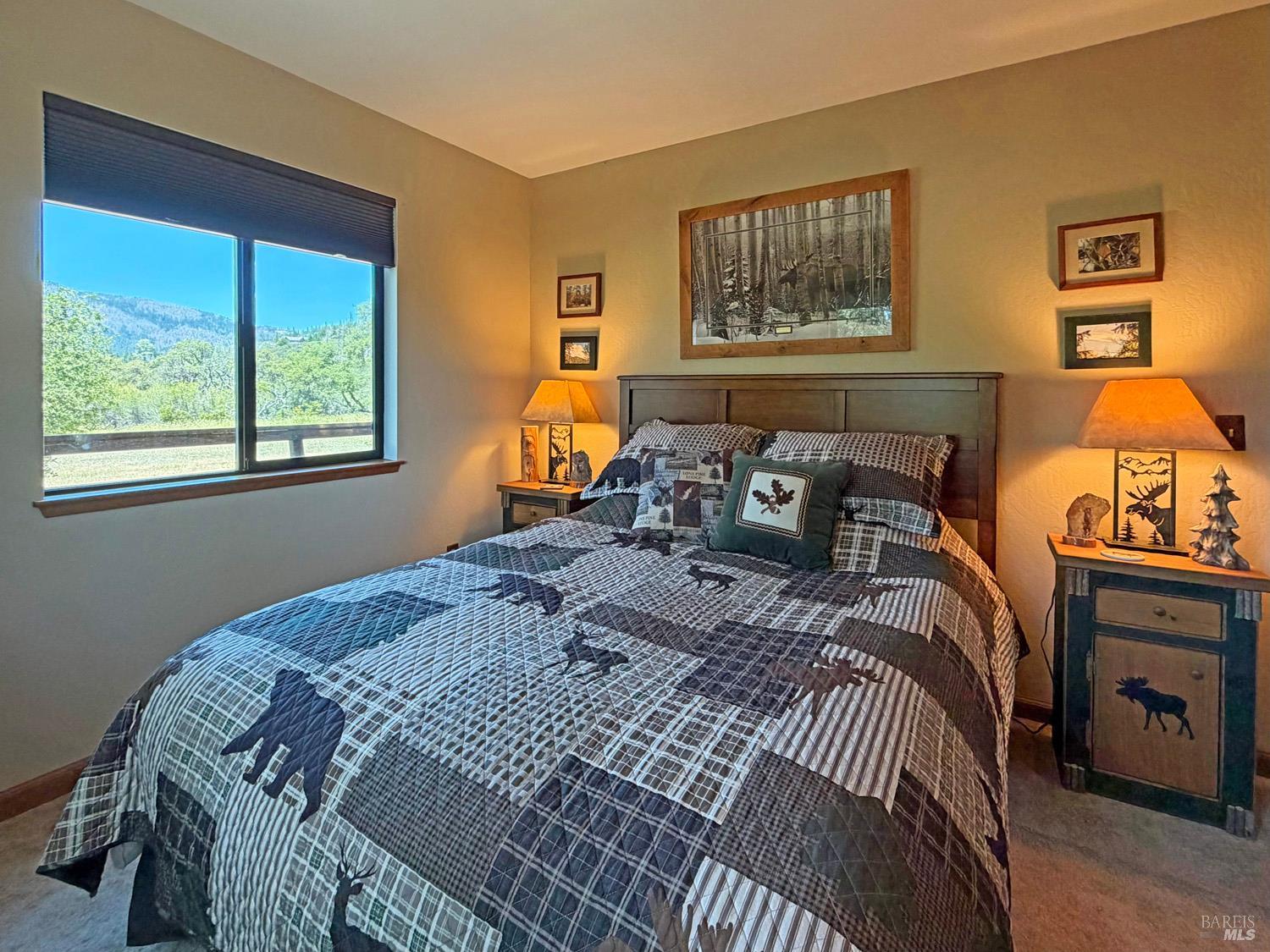 31312 High Point Road Potter Valley, CA 95469 - Photo 24 of 58 a bedroom with a bed a stove and a window