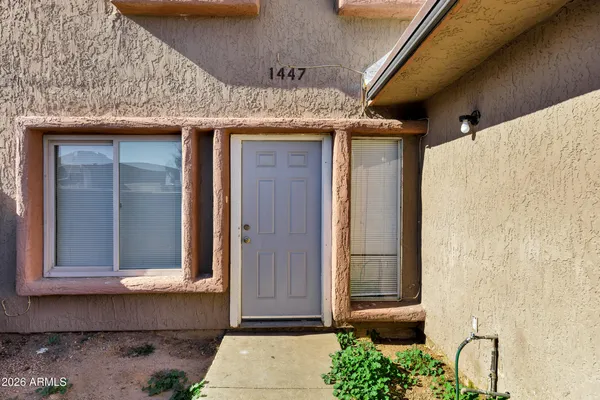 a front view of a house with a garage