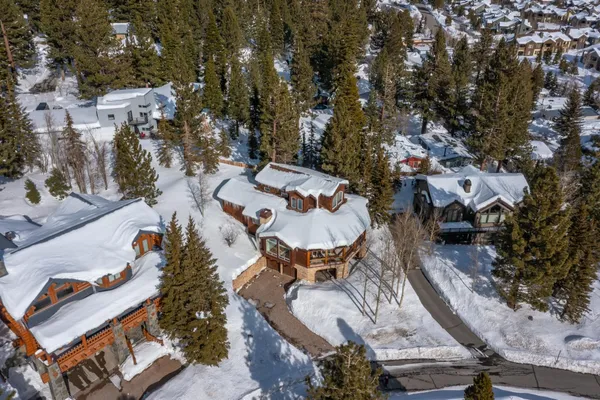 an aerial view of a house with outdoor space
