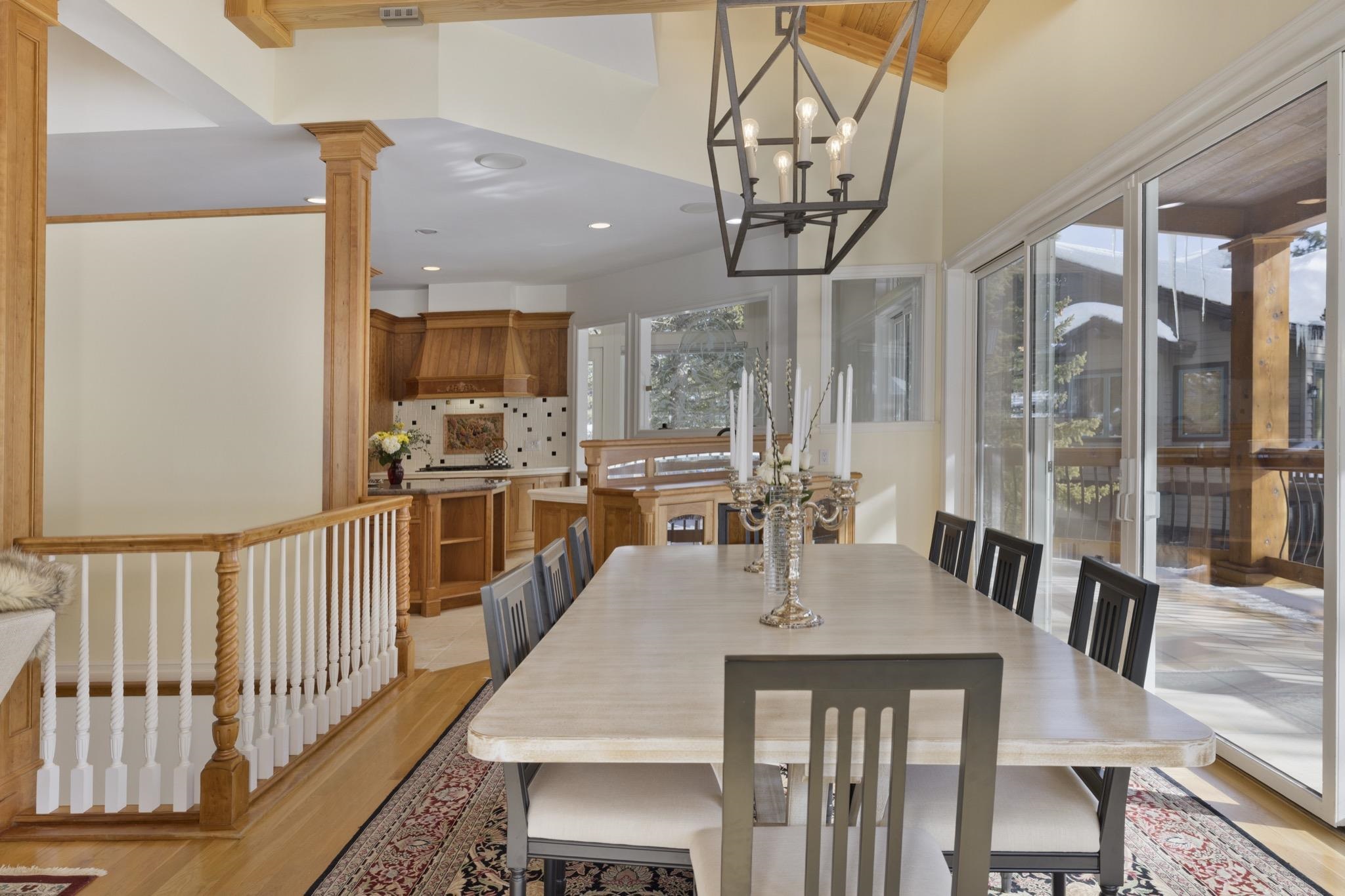 370 Ranch Road Mammoth Lakes, CA 93546 - Photo 15 of 46 Dining space featuring a chandelier and light wood-type flooring