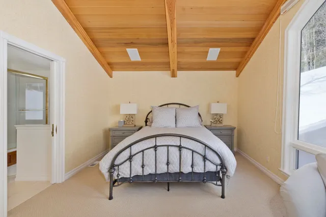 a view of a hallway with a bedroom