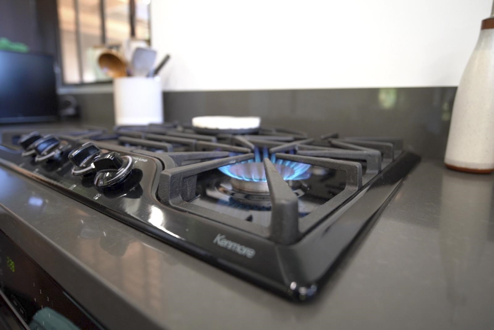 60 Lepo Place Haiku, HI 96708 - Photo 12 of 47 a stove top oven sitting inside of a kitchen