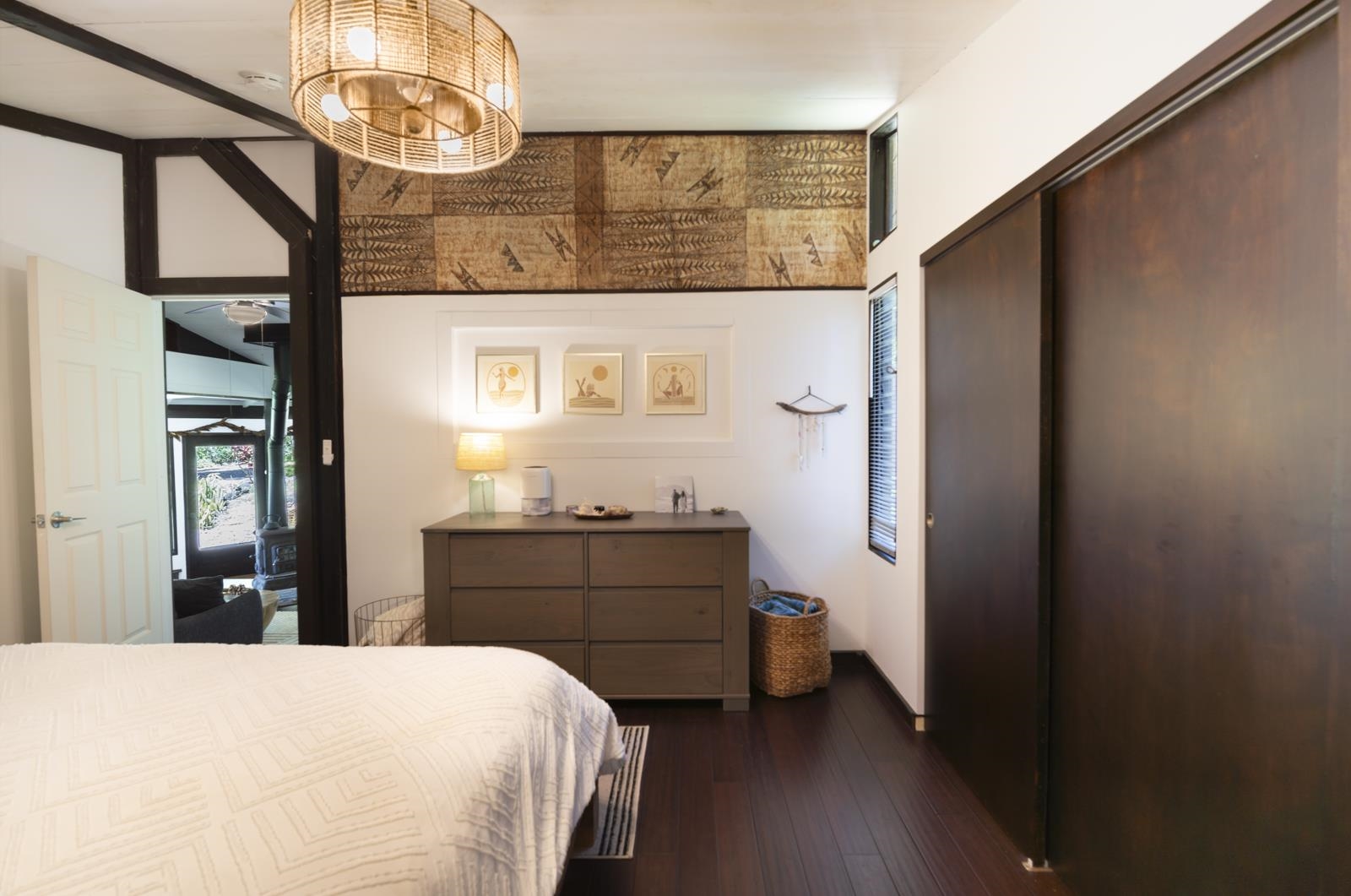 60 Lepo Place Haiku, HI 96708 - Photo 13 of 47 a bedroom with a bed and a mirror on the dresser