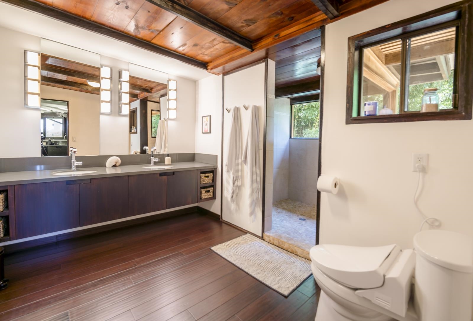 60 Lepo Place Haiku, HI 96708 - Photo 15 of 47 a spacious bathroom with a granite countertop sink toilet and shower