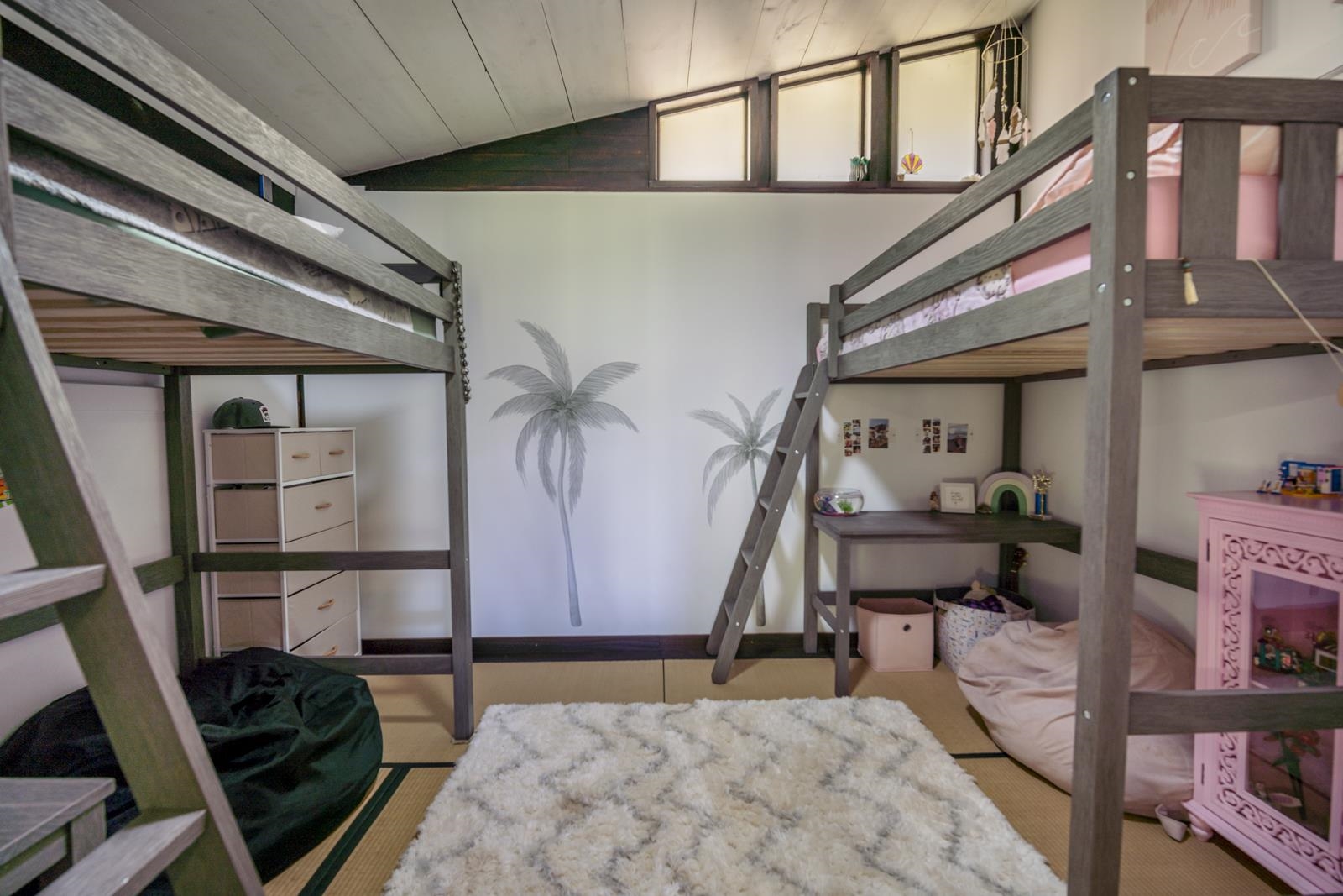 60 Lepo Place Haiku, HI 96708 - Photo 18 of 47 a view of a livingroom with furniture and staircase