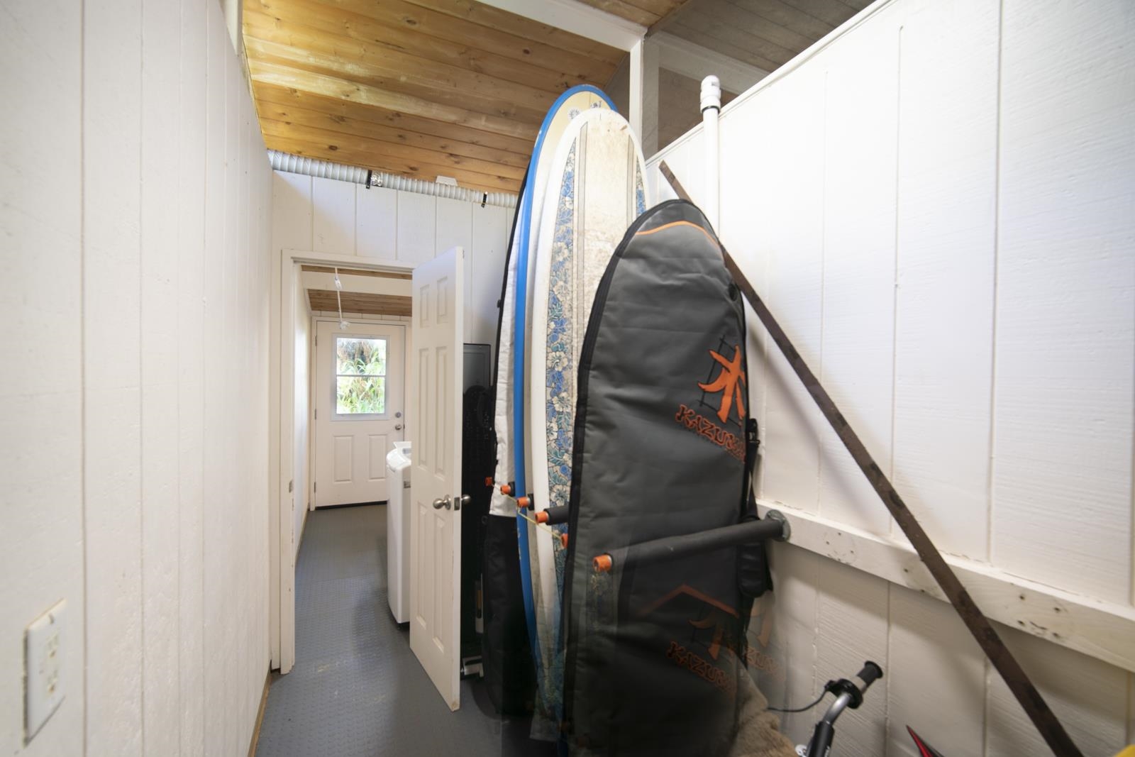 60 Lepo Place Haiku, HI 96708 - Photo 35 of 47 a view of walk in entryway with wooden floor and stairs