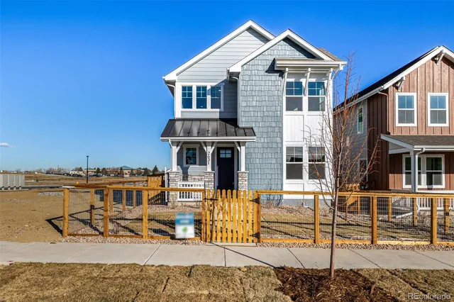 a front view of a house with swimming pool